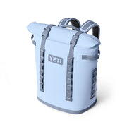 A blue sale YETI Hopper M20 backpack soft cooler with straps and branding on the front.