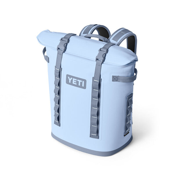 A blue sale YETI Hopper M20 backpack soft cooler with straps and branding on the front.