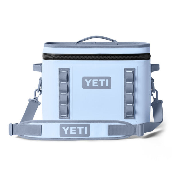 A sale YETI Hopper Flip 18 soft cooler with shoulder straps and the YETI logo on the front.